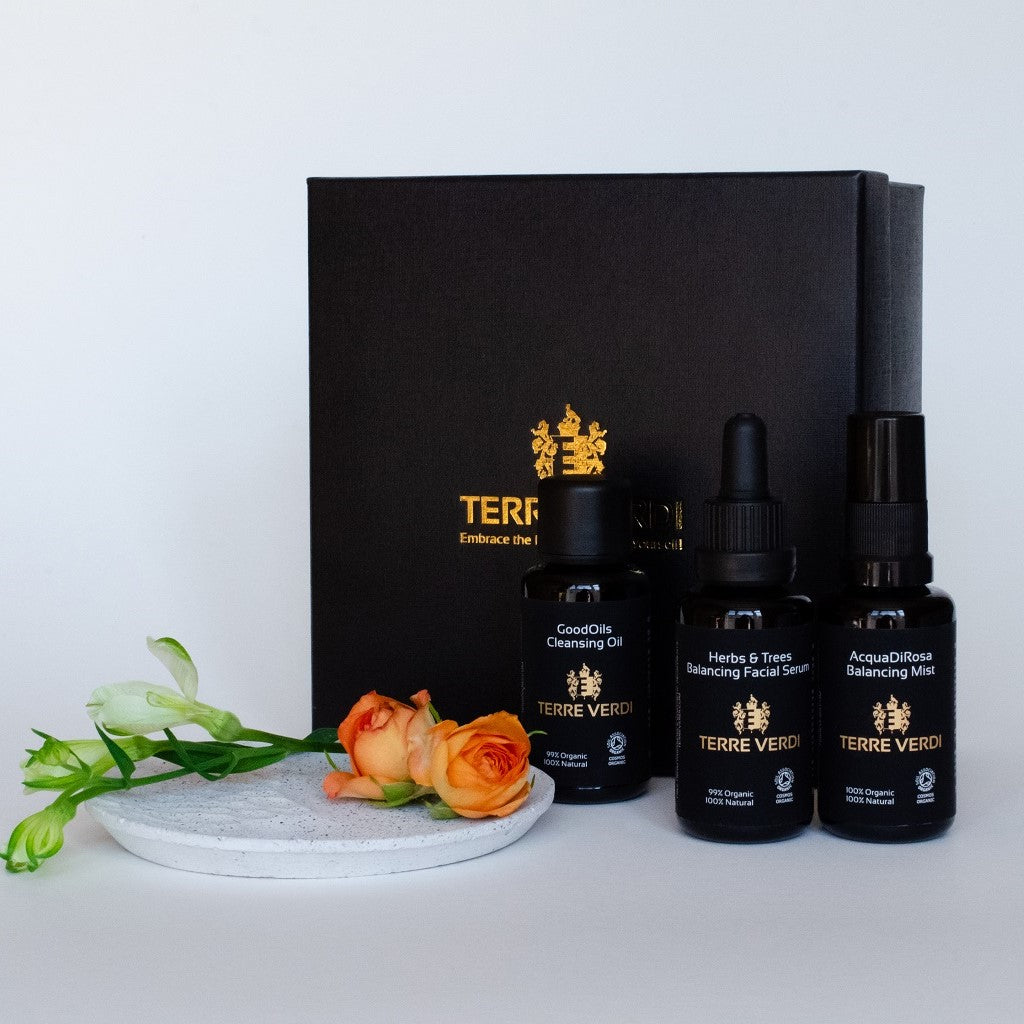 Terre Verdi Organic Skincare gift set with cleansing oil balancing facial serum and balancing mist in black bottles