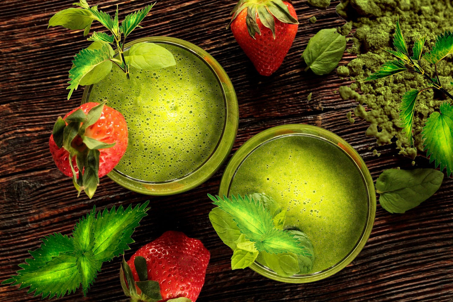 Green skincare cream with fresh strawberry and mint leaves representing organic skincare from France