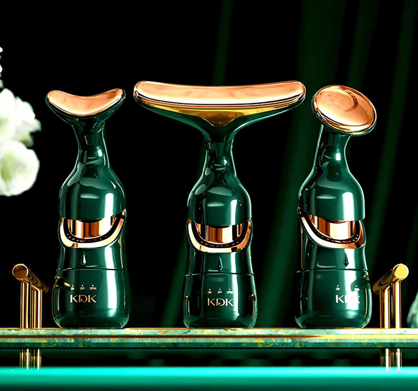 Agnès' Petit Paris Delphy-triple head facial massager set with three gold and green massage heads for skincare optimization
