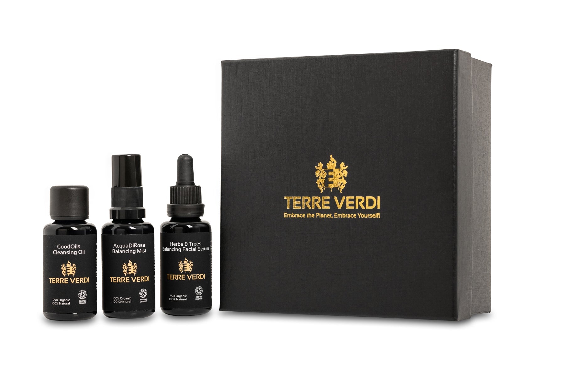 Terre Verdi Organic Skincare gift set with cleansing oil, balancing mist, and facial serum in black bottles with gold logo and black gift box