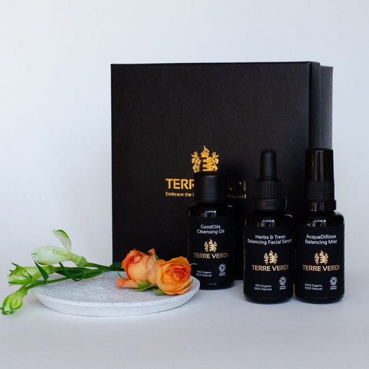 Terre Verdi Organic Skincare gift set with cleansing oil balancing facial serum and balancing mist in black bottles
